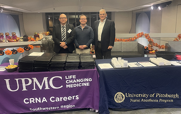 L to R: Marc Wicker, MSN, CRNA; Lane Sasala, DNP, CRNA; and Derek Reckard, MSN, CRNA, welcome guests at the 2024 SRNA Mentorship Workshop.