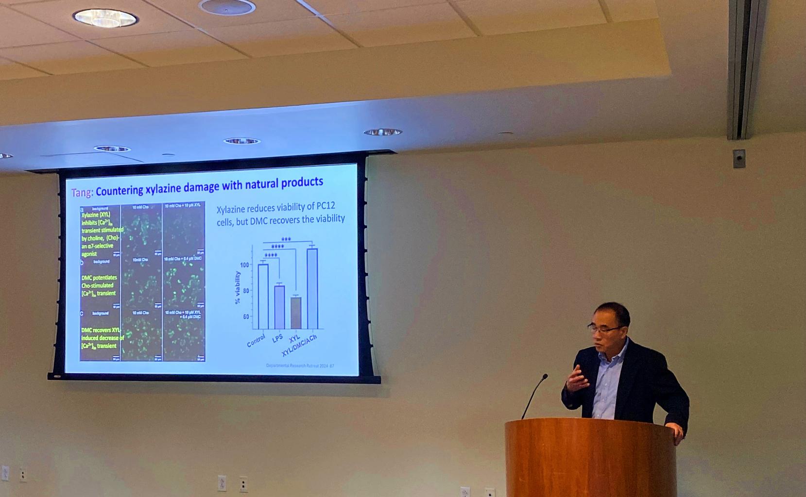 Dr. Xu delivering a presentation during the 2024 annual research retreat