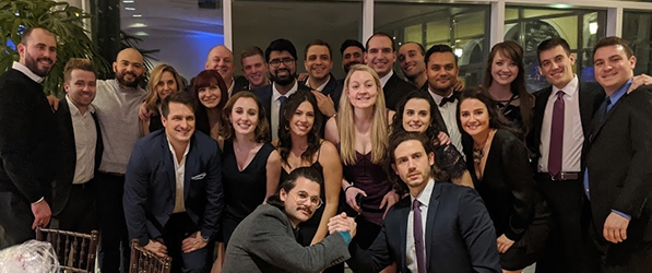 "A group of residents poses in formal wear"