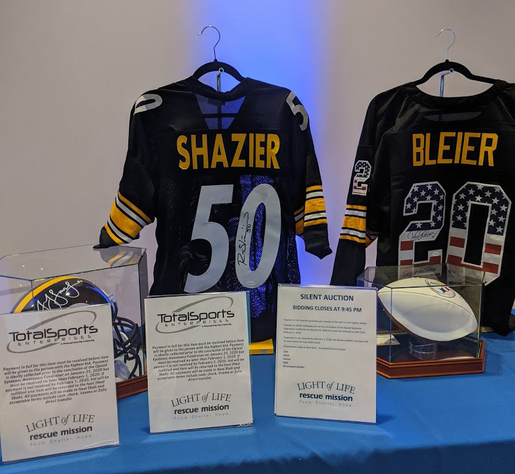 "Pittsburgh sports jerseys, a football, and football helmet, signed"