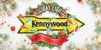  festive graphic for "Kennywood Holiday Lights" featuring a yellow arrow outlined in green and adorned with colorful Christmas lights. The words "Holiday Lights" curve above the arrow, and "Kennywood" is written in bold black text within the arrow. A red ribbon curls below, surrounded by greenery, ornaments, and candy canes on a white background.